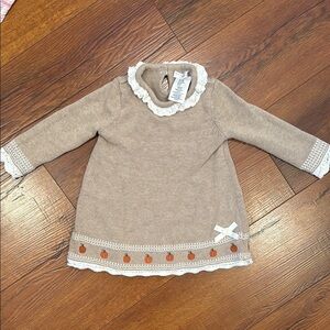 Adorable Tan Baby Dress with Lace Trim